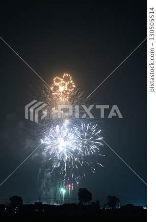 Midsummer fireworks lighting up the night sky 130505514