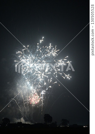 Midsummer fireworks lighting up the night sky Midsummer fireworks lighting up the night sky 130505528