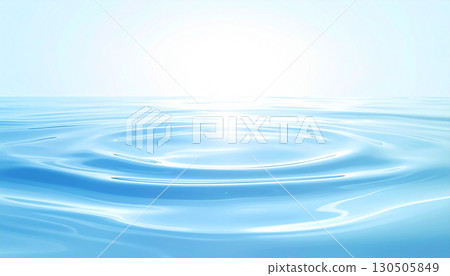 Ripples spread across the blue water surface 130505849