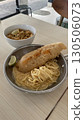 Delicious crispy fish fillet and pasta in a bowl and pan 130506073