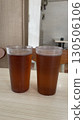 A glass of Ice lemon tea on the wooden table 130506106