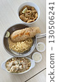 Delicious crispy fish fillet and pasta in a bowl and pan with mozzarella  130506241