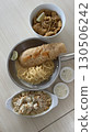 Delicious crispy fish fillet and pasta in a bowl and pan with mozzarella  130506242