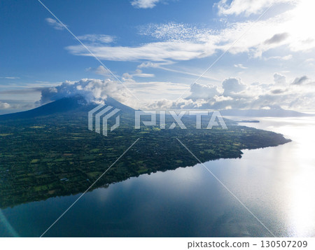 Green Ometepe island with volcanos 130507209