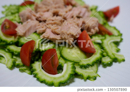 Bitter melon salad on a white plate 130507890