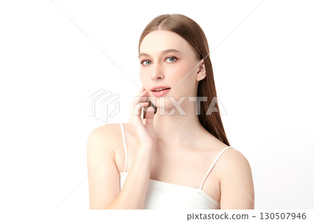 A beautiful young Asian woman with clean, fresh skin against a white background. Skincare, facial treatment, cosmetology, beauty, and spa. An elegant portrait of an Asian woman. A beautiful young Asian woman with clean, fresh skin against a white background. Skincare, facial treatment, cosmetology, beauty, and spa. An elegant portrait of an Asian woman. 130507946