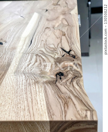 Close Up of Sandalwood Table Top with Intricate Grain Patterns and Smooth Finish Close Up of Sandalwood Table Top with Intricate Grain Patterns and Smooth Finish 130508212