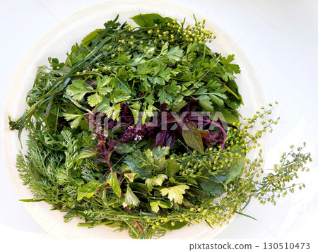 Fresh greens basil, parsley, celery, tarragon 130510473