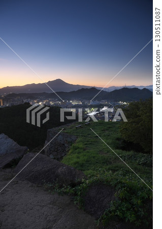 Mount Hoki Daisen and sunrise from the ruins of Yonago Castle in summer in Yonago City, Tottori Prefecture Mount Hoki Daisen and sunrise from the ruins of Yonago Castle in summer in Yonago City, Tottori Prefecture 130511087