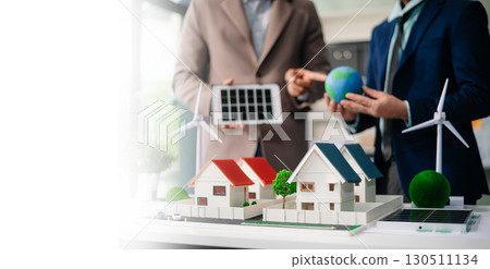 Business team people planning hand using laptop for working technology and business Net zero and carbon neutral concept.NET ZERO Business team people planning hand using laptop for working technology and business Net zero and carbon neutral concept.NET ZERO 130511134