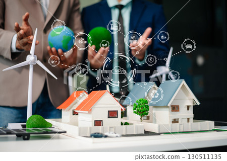 Business team people planning hand using laptop for working technology and business Net zero and carbon neutral concept.NET ZERO Business team people planning hand using laptop for working technology and business Net zero and carbon neutral concept.NET ZERO 130511135