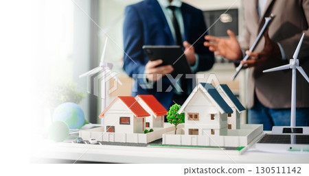 Real estate broker agent presenting and consult to customer to decision making sign insurance form agreement, home model Real estate broker agent presenting and consult to customer to decision making sign insurance form agreement, home model 130511142