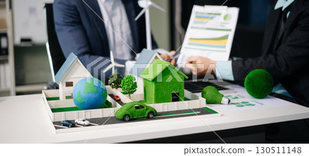 Business team people planning hand using laptop for working technology and business Net zero and carbon neutral concept.NET ZERO Business team people planning hand using laptop for working technology and business Net zero and carbon neutral concept.NET ZERO 130511148