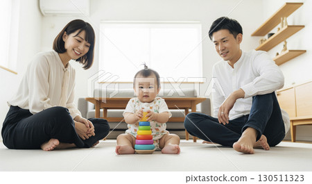 A couple watching over a baby - family image 130511323