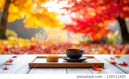 A minimalist portrait of Japanese sweets and tea in the autumn forest 130511885