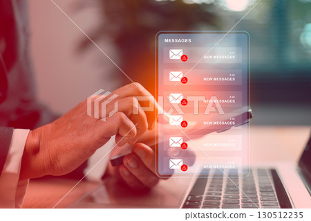 Businessman using smartphone with spam email phishing alerts on virtual screen, concept of cybersecurity threat, online fraud, scam messages, data protection, malware attack and IT security. warning Businessman using smartphone with spam email phishing alerts on virtual screen, concept of cybersecurity threat, online fraud, scam messages, data protection, malware attack and IT security. warning 130512235