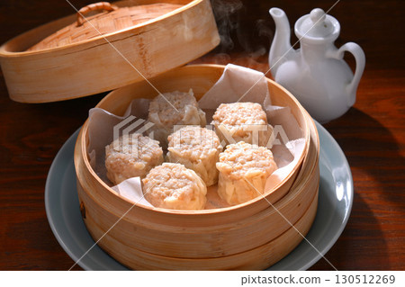 註：蒸氣是人工合成的。燒麥，一種中式食物，用蒸籠蒸煮而成。 130512269