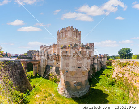 Coca castle, a magnificent medieval fortress standing tall in spain Coca castle, a magnificent medieval fortress standing tall in spain 130512970