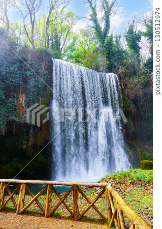 Stunning waterfall cascading in monasterio de piedra natural park, spain Stunning waterfall cascading in monasterio de piedra natural park, spain 130512974