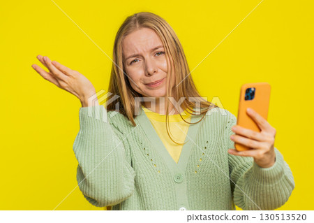 Upset sad woman use smartphone play game loses loss fail unlucky news bad lottery results crisis Upset sad woman use smartphone play game loses loss fail unlucky news bad lottery results crisis 130513520