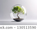 A small tree bonsai into a crystal sphere 130513590