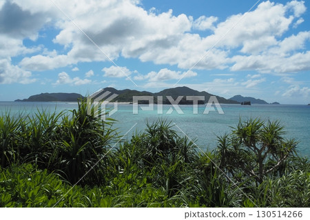 Blue sea and white boat, white sand beach and green island Blue sea and white boat, white sand beach and green island 130514266