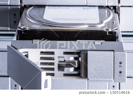 detail of hard disk in a tray that is being installed inside dat detail of hard disk in a tray that is being installed inside dat 130514616
