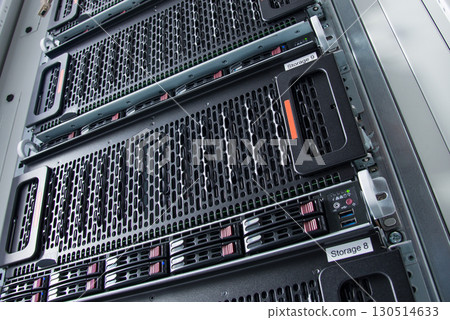 Array of data storage hard drives in internet data center 130514633