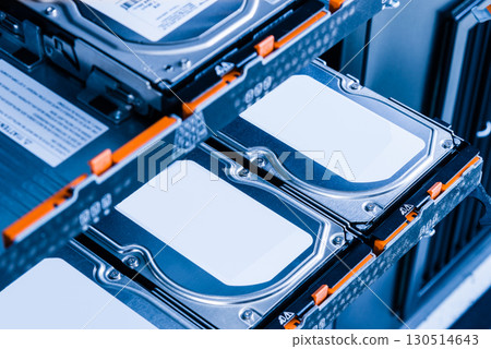 close up of hard disk drives inside hosting center 130514643