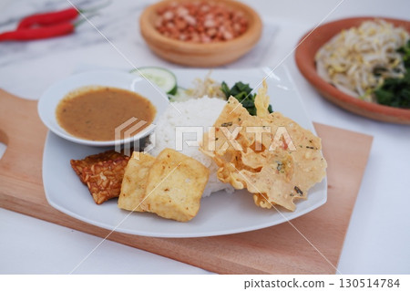 Homemade Indonesian Meal with Tempeh and Tofu Homemade Indonesian Meal with Tempeh and Tofu 130514784