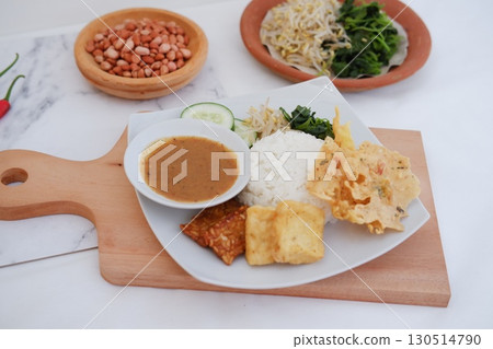 Homemade Indonesian Meal with Tempeh and Tofu Homemade Indonesian Meal with Tempeh and Tofu 130514790