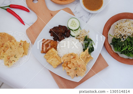 Homemade Indonesian Meal with Tempeh and Tofu 130514814