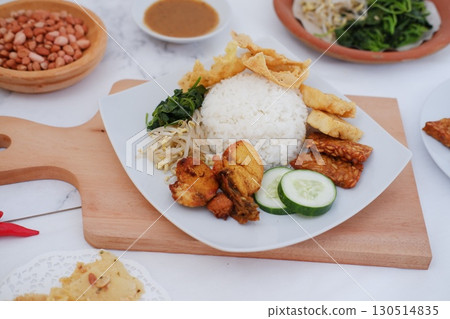 Homemade Indonesian Meal with Tempeh and Tofu Homemade Indonesian Meal with Tempeh and Tofu 130514835