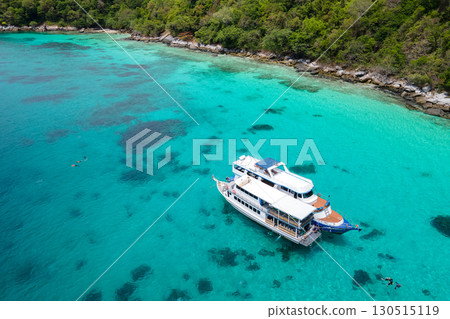 Aerial view of two recreational vessels over turquoise clear water at Racha Island, Phuket, Thailand 130515119