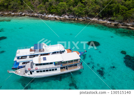 Aerial view of two boats anchoring over turquoise clear water at Racha Noi Island, Phuket, Thailand 130515140