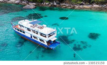 Aerial view of scuba diving boat anchoring over turquoise water at Racha Island in Phuket, Thailand 130515150