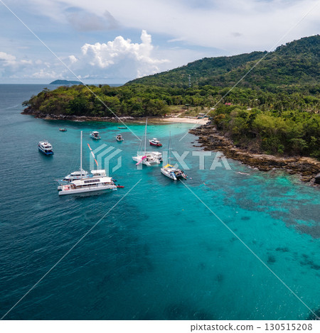 Aerial view of Koh Racha Yai Island with many tour boats around the bay in Phuket, Thailand. 130515208