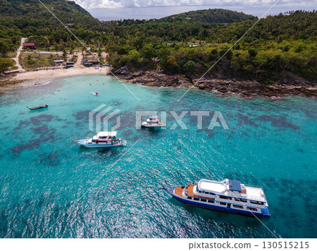 Aerial view of Koh Racha Yai Island with many tour boats anchoring in the bay in Phuket, Thailand. 130515215