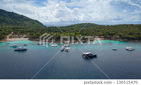 Aerial view of Koh Racha Yai Island with many tour boats in Phuket, Thailand. 130515470