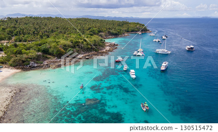 Aerial view of Koh Racha Yai Island with many tour boats in Phuket, Thailand. Aerial view of Koh Racha Yai Island with many tour boats in Phuket, Thailand. 130515472