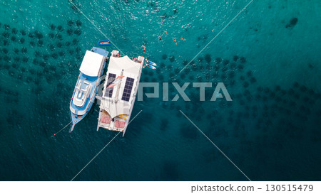 Aerial view of tour boat and catamaran anchoring over the artificial reef at Racha Yai Island 130515479