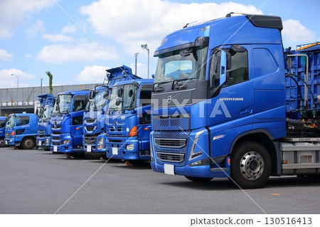Image of large trucks lined up Image of large trucks lined up 130516413