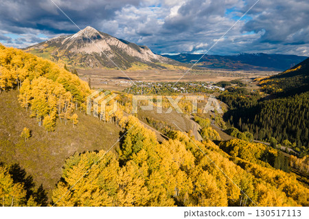 Aerial view of beautiful fall foliage landscape during golden sunset at Crested Butte, Colorado, USA 130517113