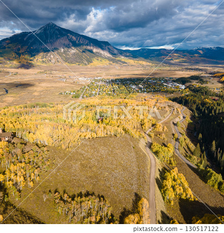 Aerial view of beautiful fall foliage landscape during golden sunset at Crested Butte, Colorado, USA 130517122