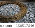 A bundle of iron wires laid on gravel 130517846