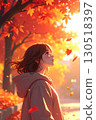 Woman looking at autumn leaves 130518397