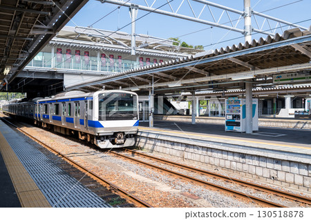 [Iwaki Station] A local train on the Joban Line waiting to depart 130518878