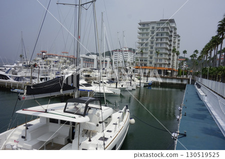 Boats and yachts moored at the yacht harbor at Hayama Marina 130519525