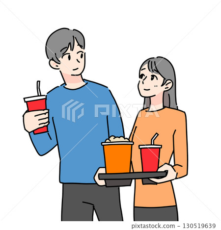 一對夫婦在電影約會時買爆米花和飲料 130519639