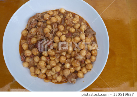 pig tryp dish as typical spanish tapas food with chickpeas pig tryp dish as typical spanish tapas food with chickpeas 130519687